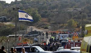 kills three Israelis at settlement